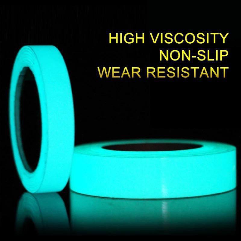 A close-up of the original imported glow in the dark tape emitting a bright green light in a dark room (6)